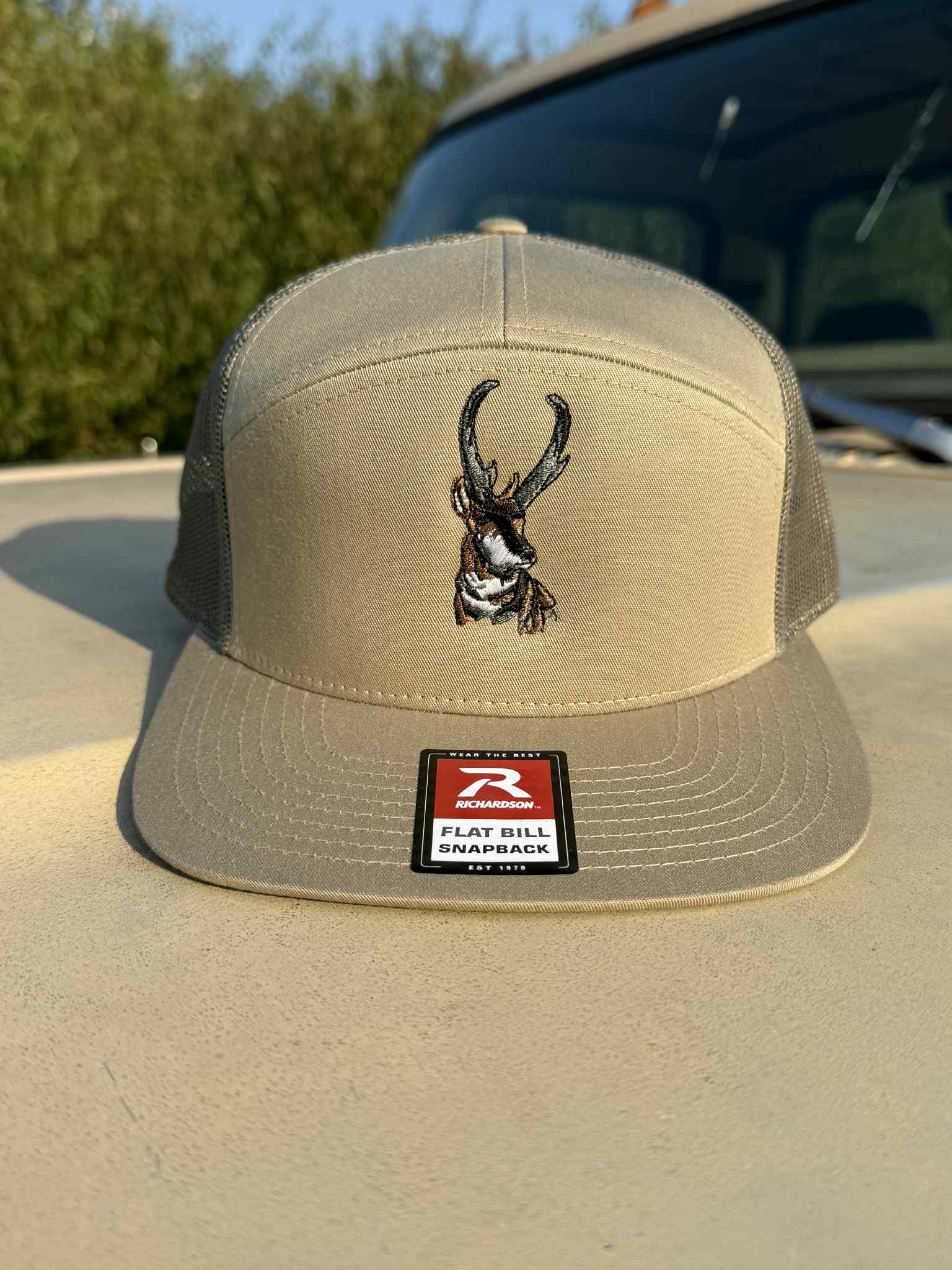 King of the Plains hat with embroidered pronghorn on sand-colored Richardson flatbill snapback
