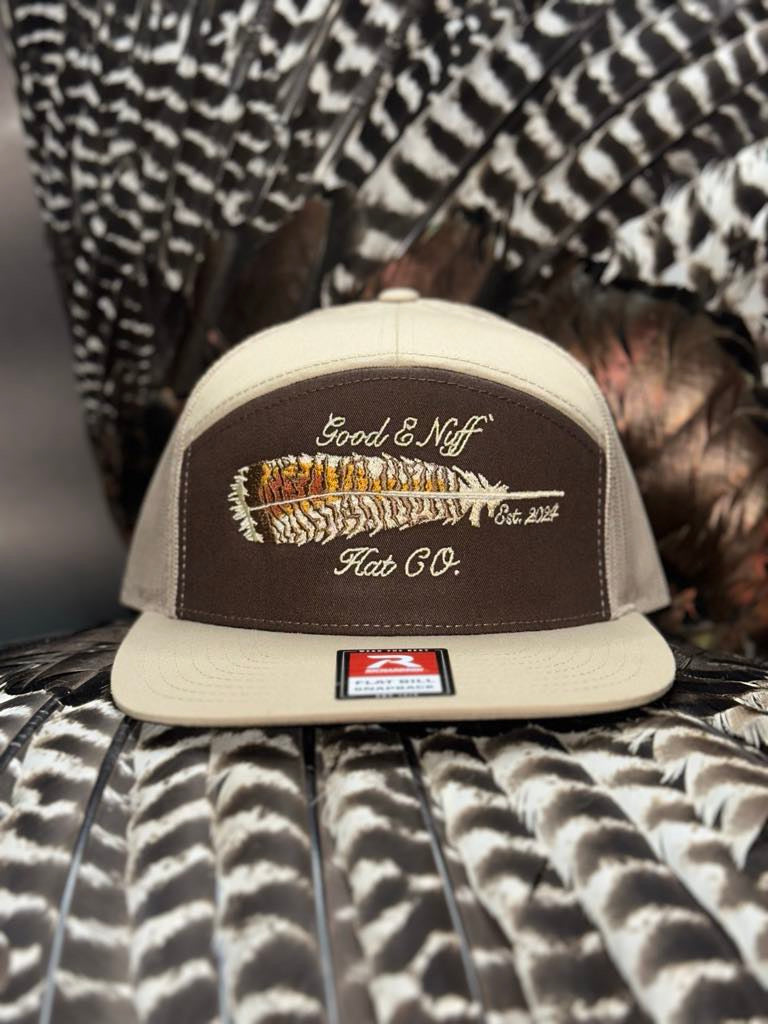Embroidered "The Roost" hat with turkey feather design and "Good E Nuff' Hat Co." logo, perfect for outdoor enthusiasts.