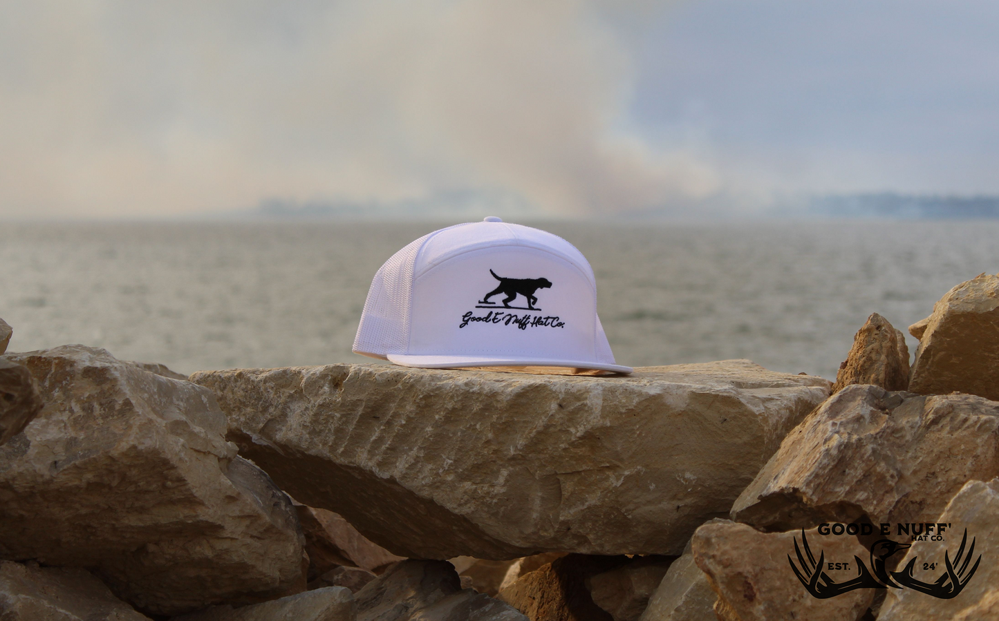 Point and Shoot hat with sleek pointing dog graphic and "Good E Nuff' Hat Co." text, perfect for casual outings.