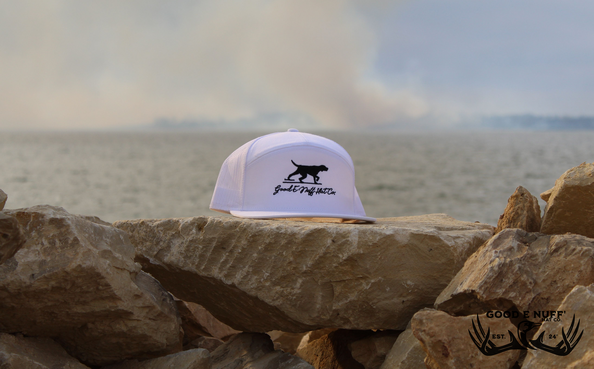 Point and Shoot hat with sleek pointing dog graphic and "Good E Nuff' Hat Co." text, perfect for casual outings.